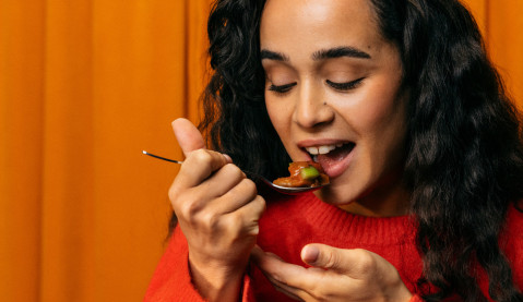 Woman enjoying flavorful meal
